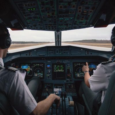 two-pilots-in-the-cockpit-of-an-airplane